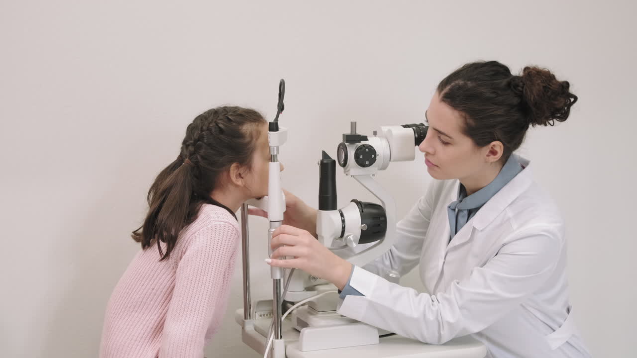 Little Girl Visiting Oculist For Eye Checkup