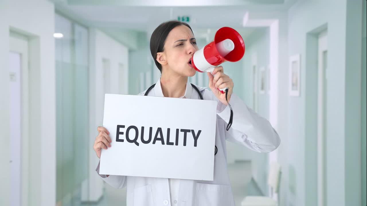 Angry Indian female doctor protesting for EQUALITY