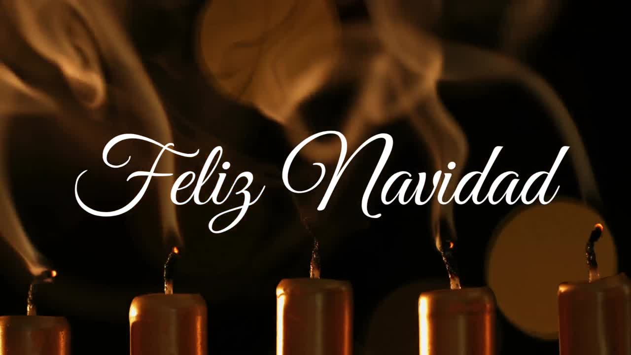 feliz navidad escrito sobre las velas