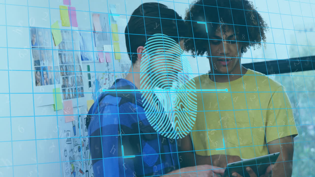 Fingerprint scan animation over two people collaborating in creative workspace