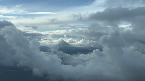 cloudscape shot from a jet cabin, an unique pilot’s perspective