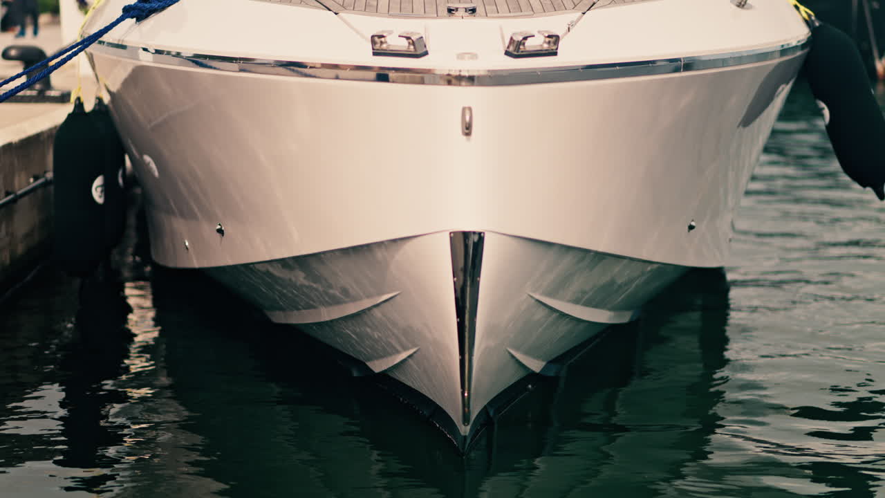 Close up of a white boat docked in the harbour of Golfe-Juan, France