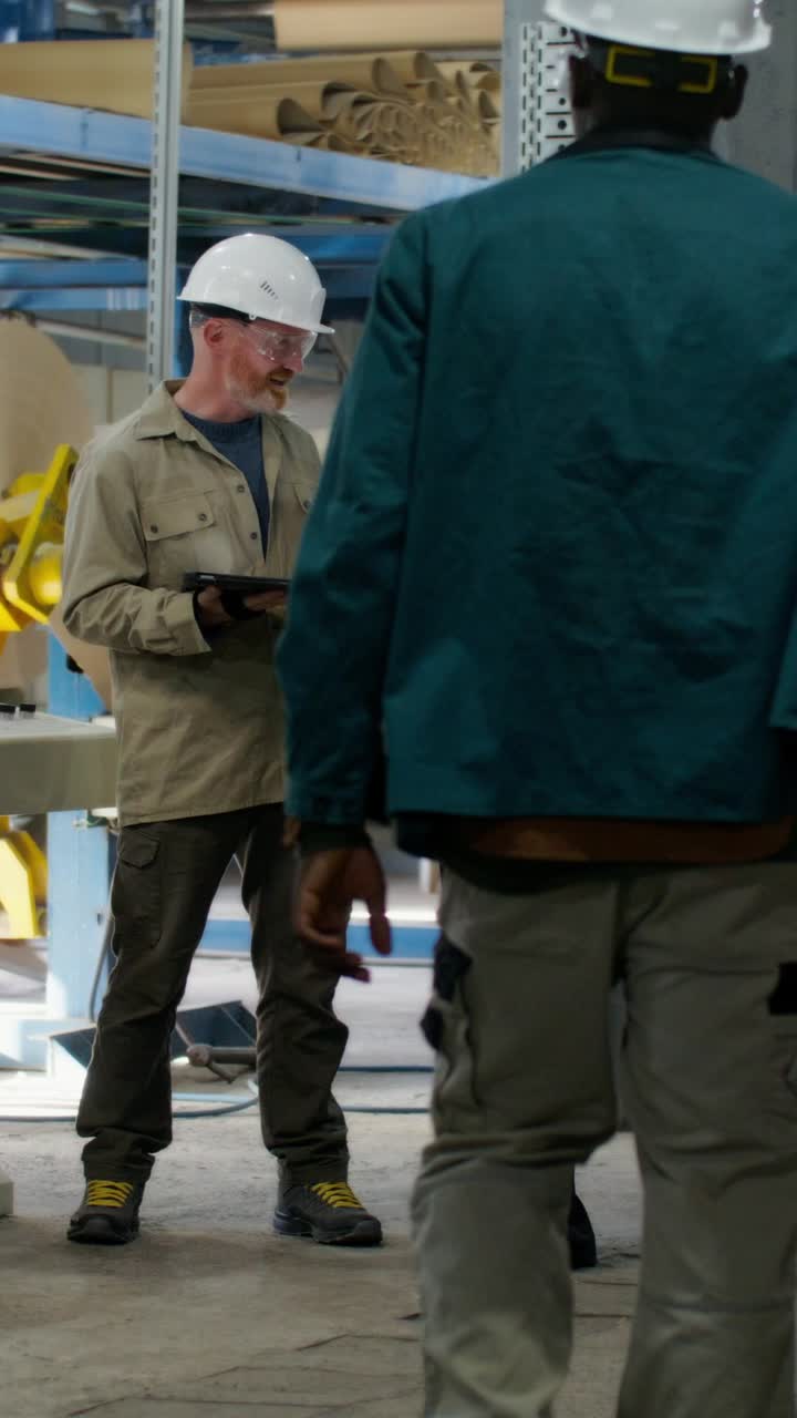 Factory Workers in Discussion