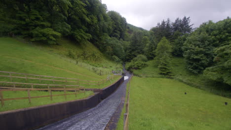 wide shot of the cogra moss dam spillway at cogra moss lake. west lake district