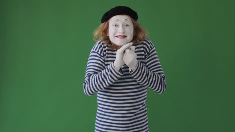 mime artist impressed on admiring something at far end