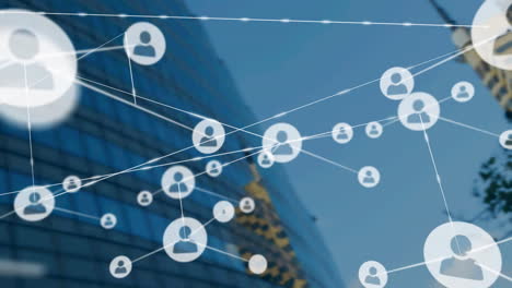 animation of network of connections with icons over modern office building