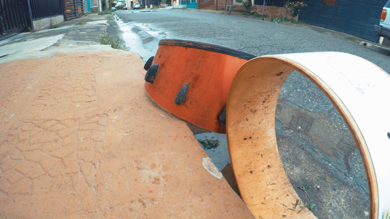 Old Drum Tossed to Curb