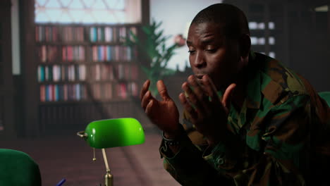 therapist offering help to army soldier during psychotherapy session