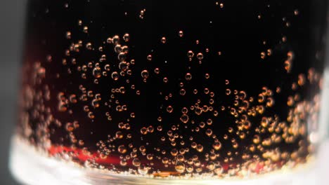 cococola bubbles in glass closeup view