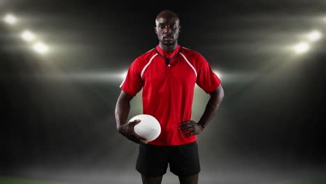 jugador de rugby profesional de pie frente a un reflector