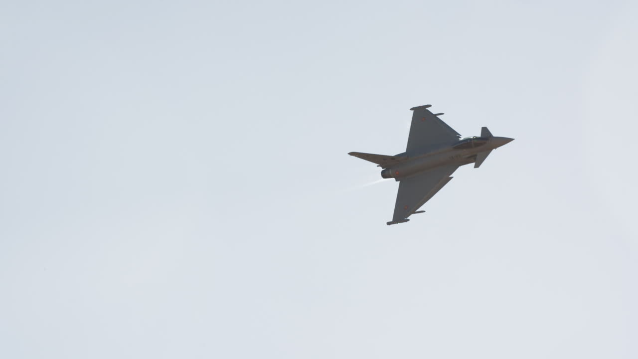 Eurofighter Typhoon Military Jet Flying in Clear Sky