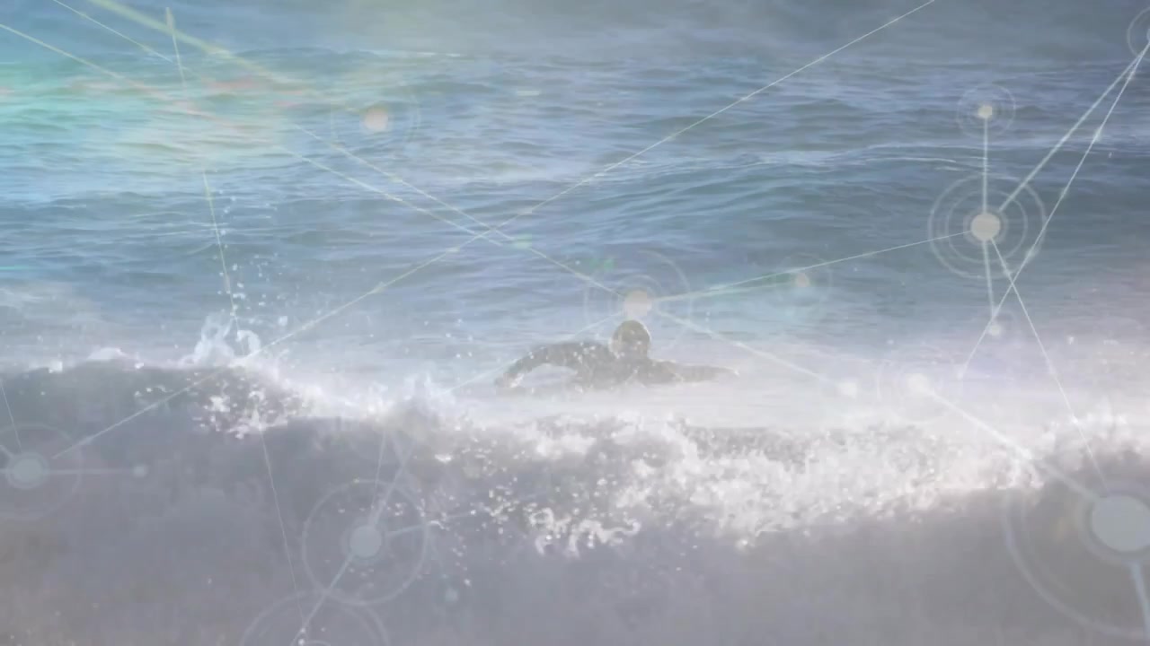 HUD node arising and overlaying scene while male paddling board over surf showing marine data