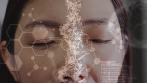 animation of molecular structures and medical data over close up of asian woman opening eyes