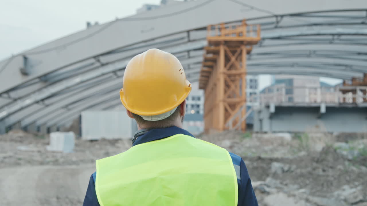 Slowmo of Construction Site Foreman at Work