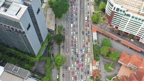 top down birds eye view capturing the congested traffics on jalan tun razak in downtown kuala lumpur at peak hour, malaysia southeast asia