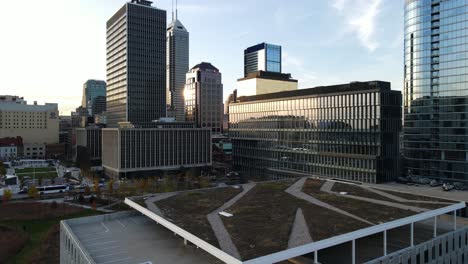 indianapolis-downtown-aerial-footage-during-golden-hour-between-buildings,-indiana