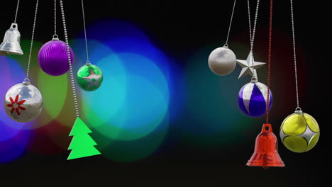 animación de decoraciones de bolas de navidad sobre fondo negro