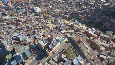 aerial view flying over the dense, urban cityscape of la paz, bolivia