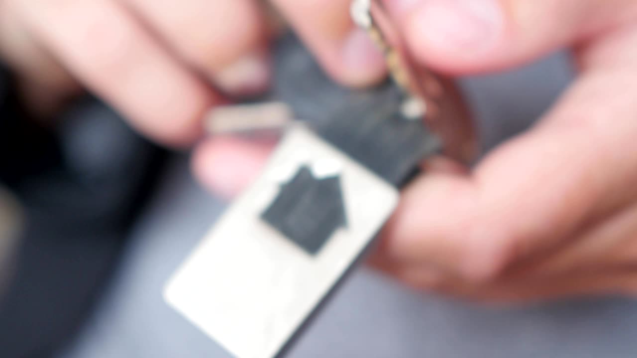 showing a bunch of keys to the camera to the camera