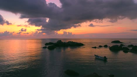 sunset painting over the ocean