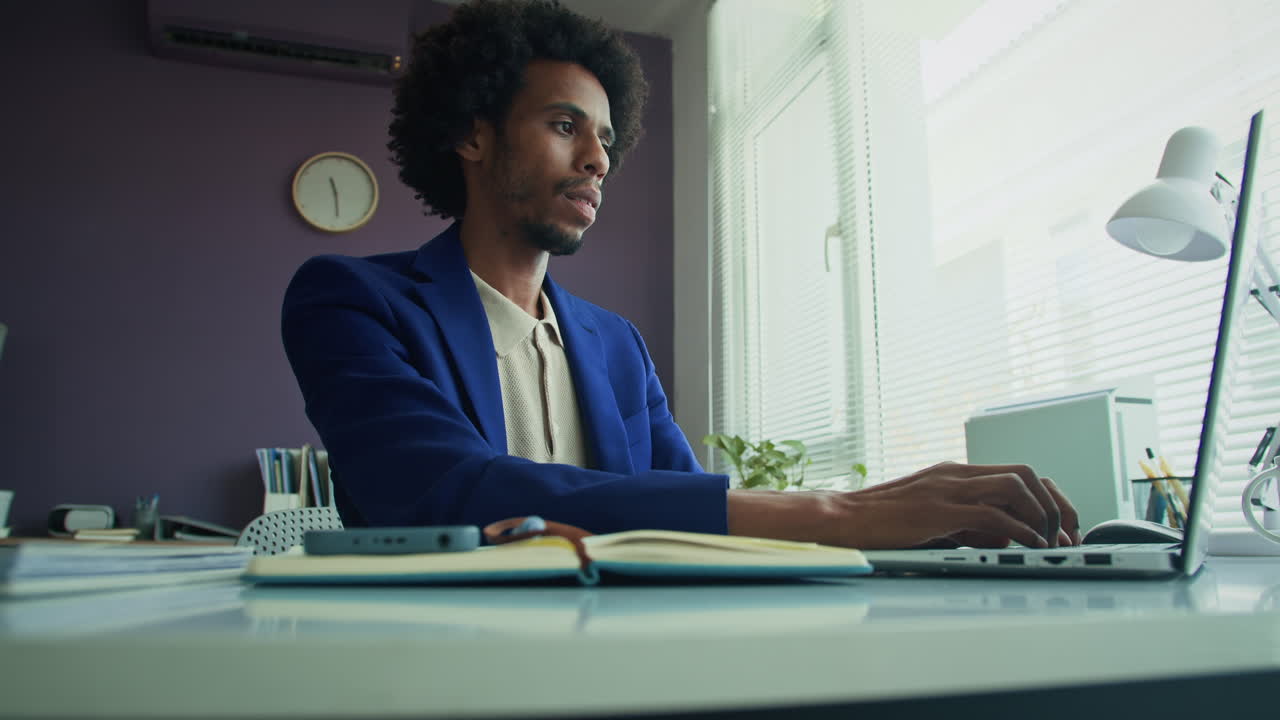 Black Tired Employee Working at Office at Late Hours