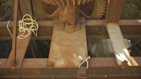 closeup footage of an old rustywell mechanism