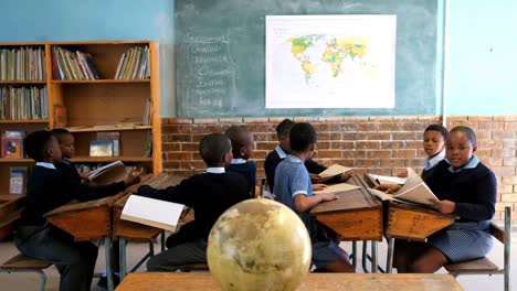 schoolkids studying in the classroom 4k