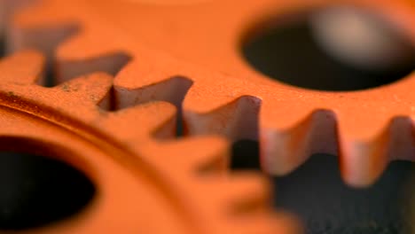 clock 's mechanism: wheels spinning together- macro