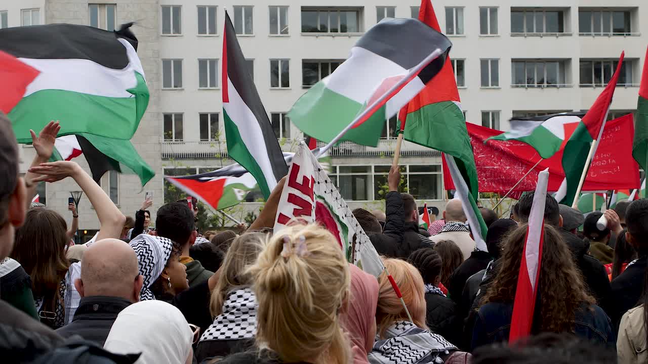 Pro Palestine protesters march against Israel’s Eurovision participation in Malmö (Sweden), calling for a ceasefire on the war in Gaza, Eurovision song contest 2024, medium handheld shot