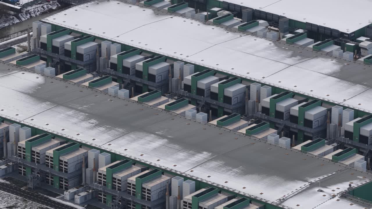 Aerial drone close up views of data center emergency power backup systems and HVAC cooling infrastructure in the Netherlands, highlighting critical energy reliability and climate control for digital o