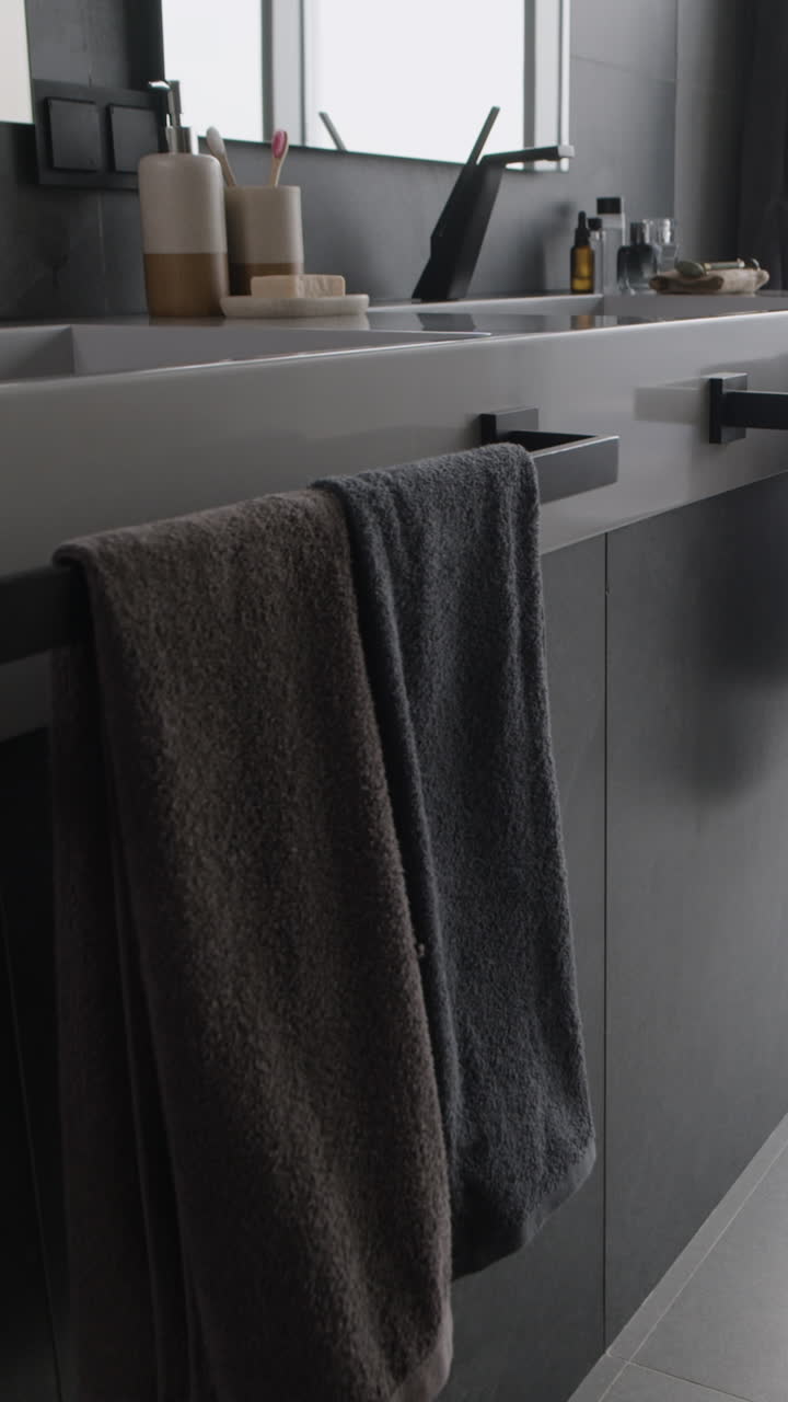 Modern Bathroom with Grey Towels