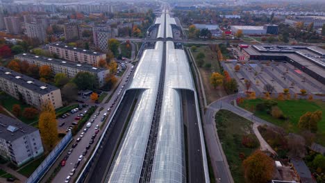 aerial wide view, city overhead glass structure, industrial zone, autumn