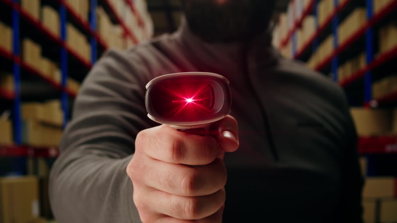 Scanner scan delivery box in storage, E-commerce shop, man packing goods and clothes second hand delivery market, courier Packaging and Shipping Workspace with Supplies and Technology, online sales.