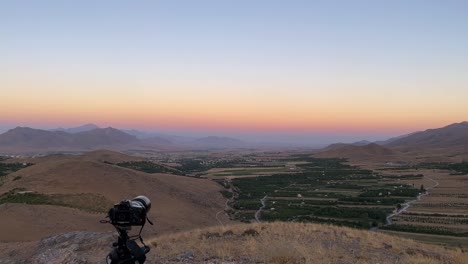 photography experience in mountain highland panoramic landscape view of wide horizon blue sky line in mountain region in esfahan the garden orchard field green hay bale fruit tree a colorful twilight