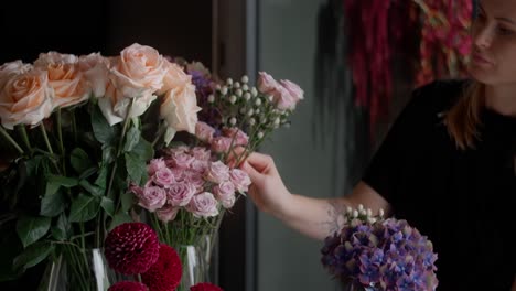 florist arranging a beautiful flower bouquet