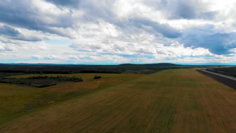 4K-Drone-Video-of-Chena-River-cutting-through-Forest-near-Fairbanks,-Alaska