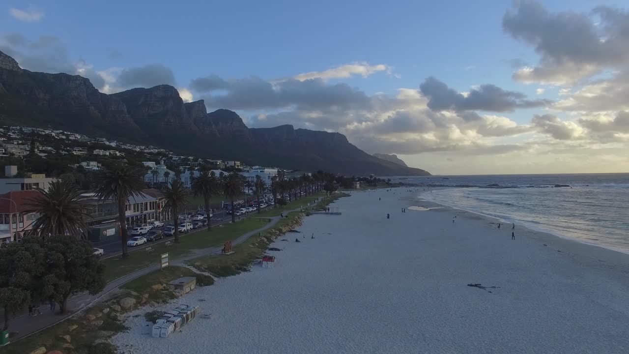 Camps Bay Beach in Cape Town, South Africa, aerial view during Sunset with Table Mountain in the background