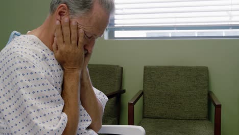 depressed patient sitting on a chair