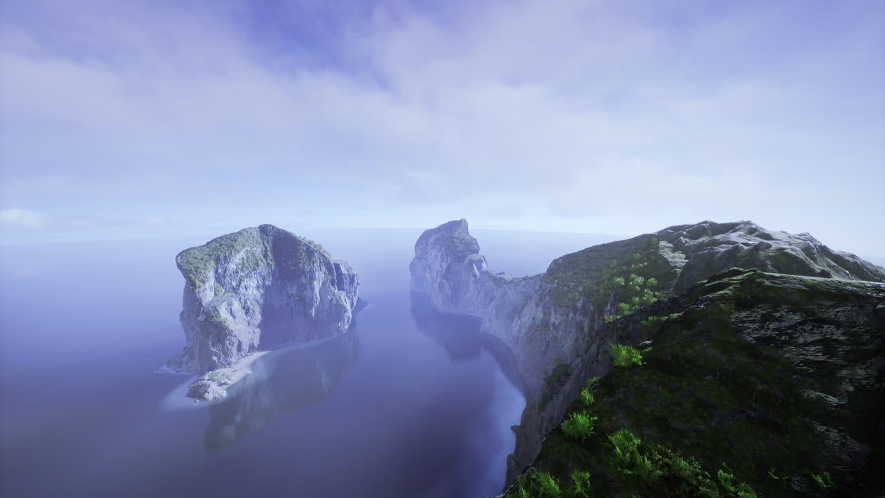 Beautiful view of rocky coastline and calm sea under a blue sky