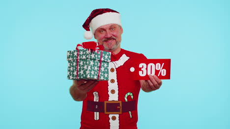 Man-in-Christmas-t-shirt-showing-gift-boxes-and-30-Percent-discount-inscriptions-banner-text-note