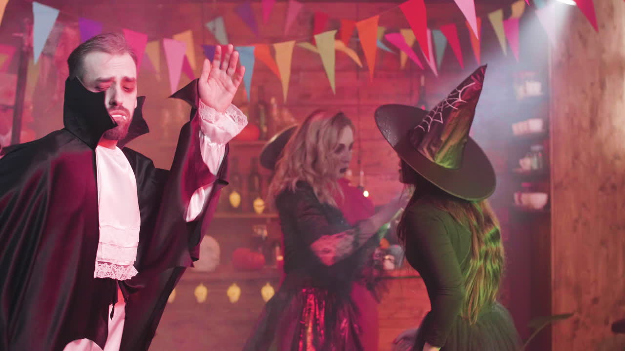 Halloween party with people in costumes