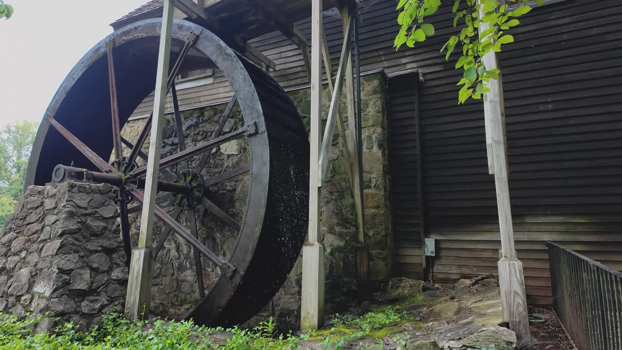 Waterwheel on a colonial mill for grinding at Meadow Run