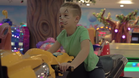 child having fun with motorbike racing game