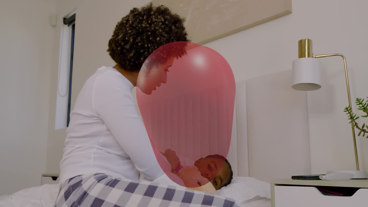 Mom holding child on bed talking on phone sparking red heart over both soothing for parenting