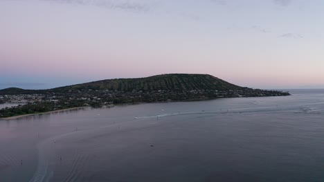 Wide-aerial-shot-of-a-volcanic-cone-formation-along-the-coast-in-O'ahu