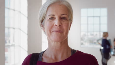 portrait happy old caucasian woman enjoying yoga class smiling cheerful middle aged female practicing healthy fitness lifestyle in workout studio