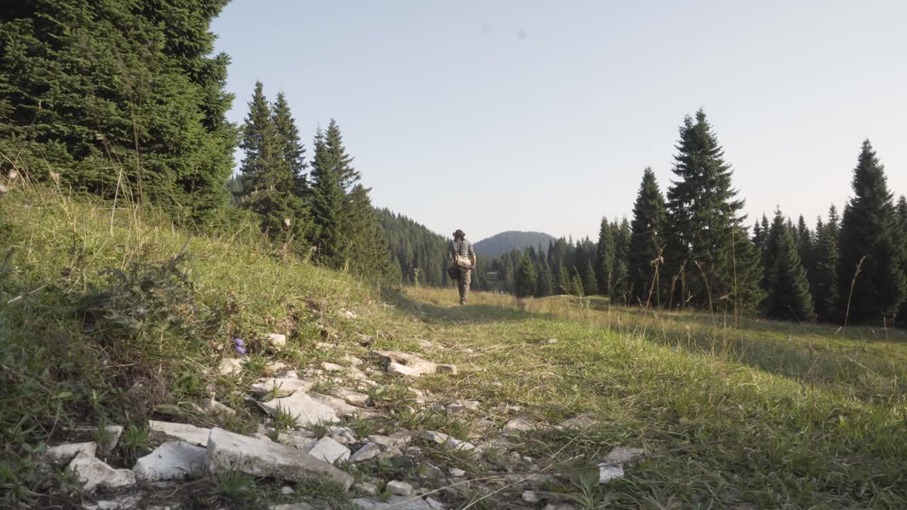 Hiker walking on the path
