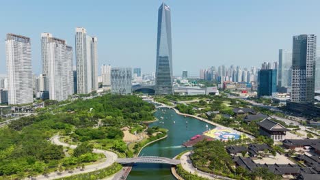 Panning-up-from-parklands-in-South-Korea-to-a-skyscraper