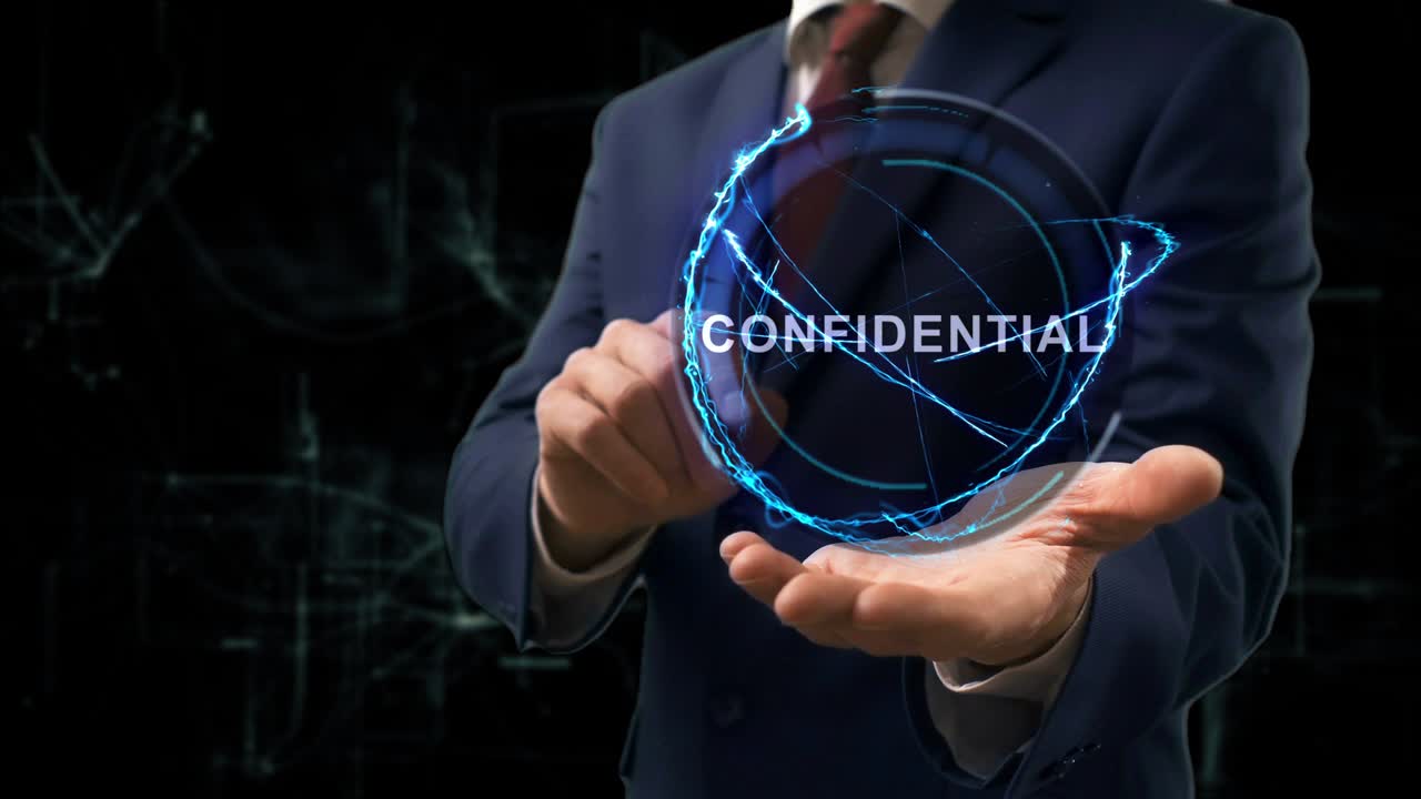 Businessman shows concept hologram Confidential