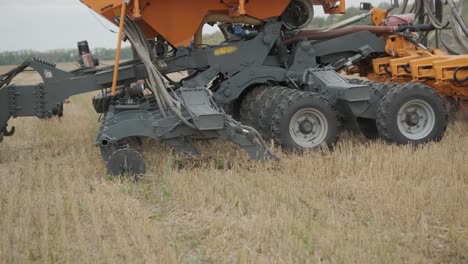 demonstration of agricultural machinery at an exhibition. tractors operate in the field, showcasing their capabilities and performance in action